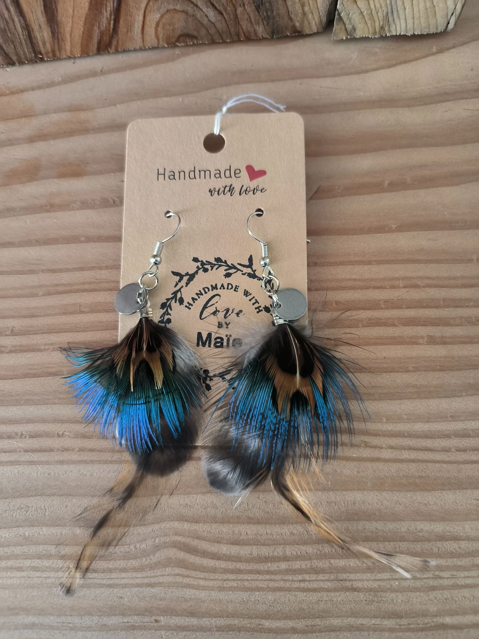 Boucles d'oreilles bohème chic originales en plumes naturelles
